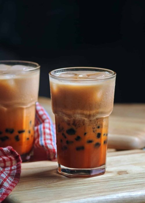 glass of bubble tea on wooden table
